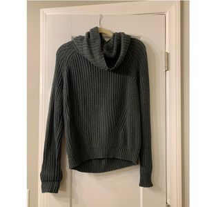 Turtle neck sweater.